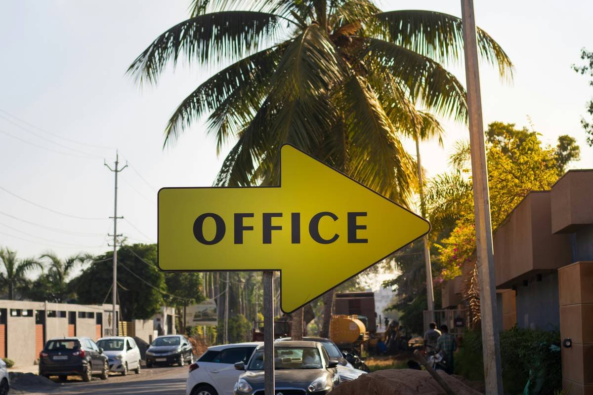 Business signage seasonal office jim sign using magnetic autumn-themed overlay on brushed aluminum base